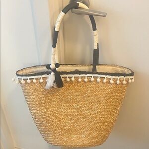 Stylish Tan Straw Tote Bag with Black Accents